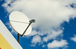 Satellite dish on roof of house
