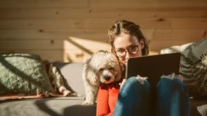 Woman using tablet at home