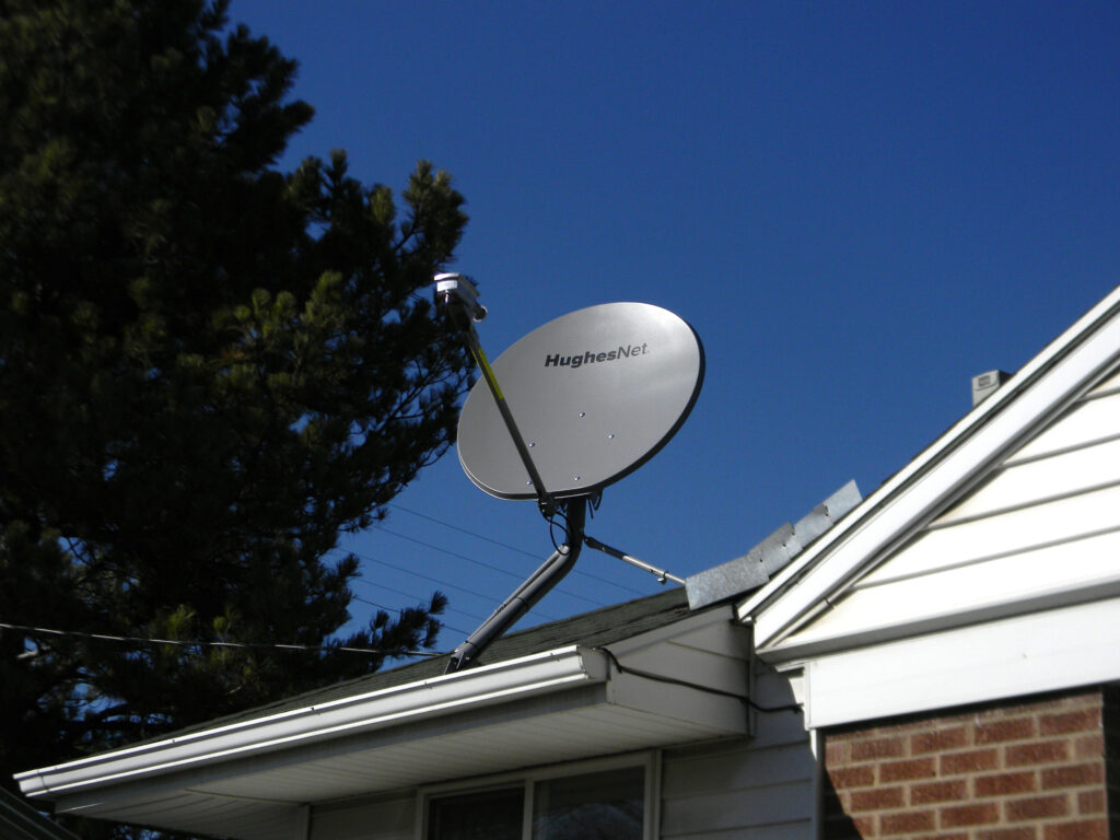 HughesNet internet satellite dish installed on our roof