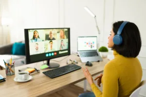 Remote worker leading a video meeting using a computer, highlighting satellite internet for reliable streaming and calls.